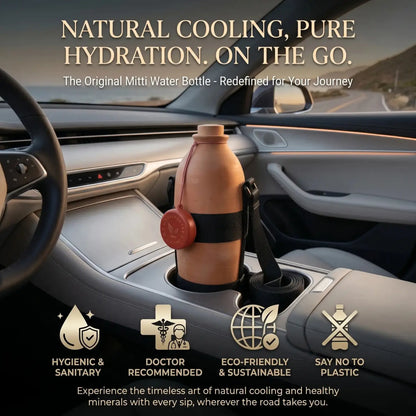 An unpainted mitti ki bottle with an adjustable carrying strap placed securely inside a vehicle cup holder, highlighting naturally cool hydration for road trips and driving in Pakistan